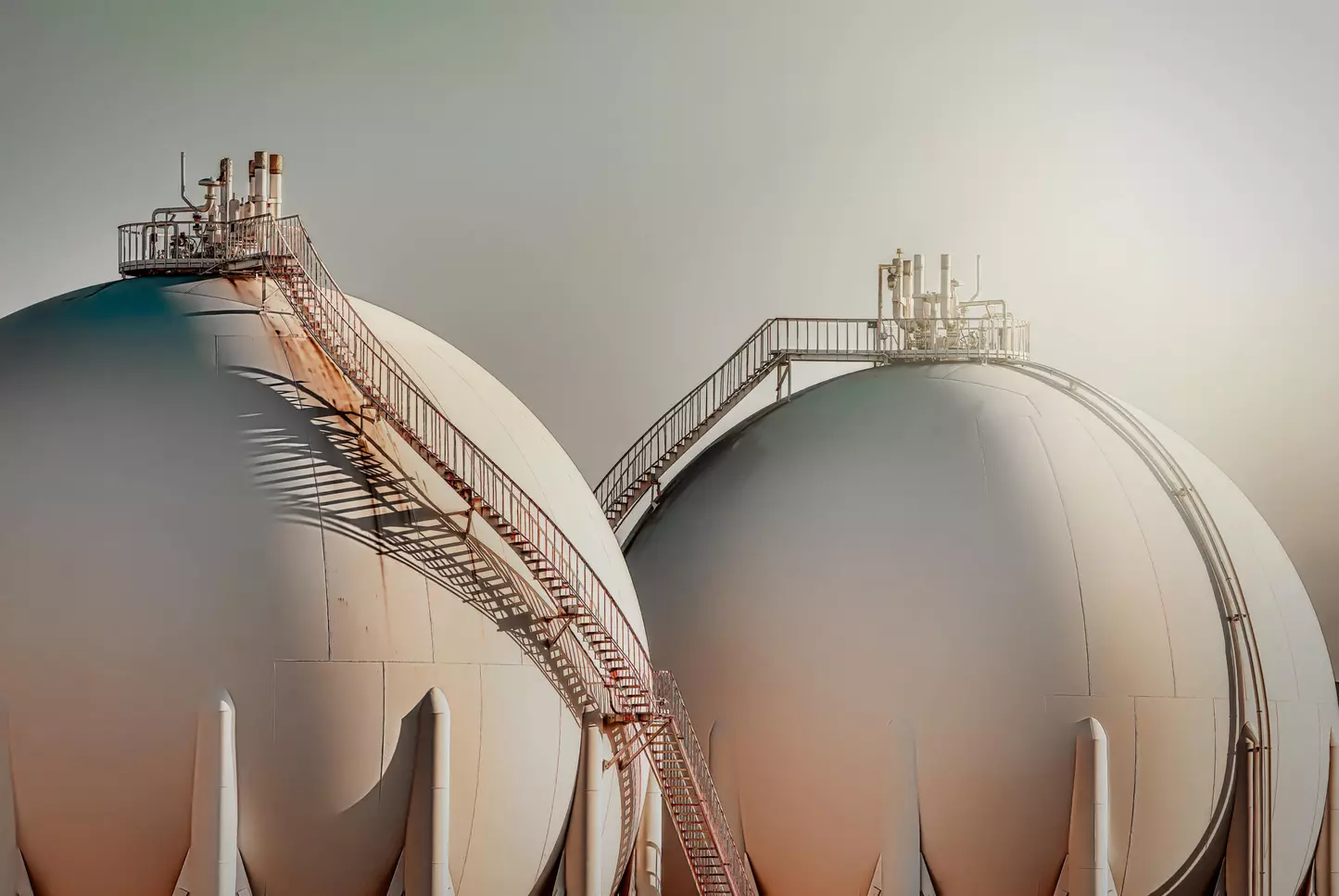 Sphere gas tanks. Regasification plants are necessary to make liquid natural gas usable again