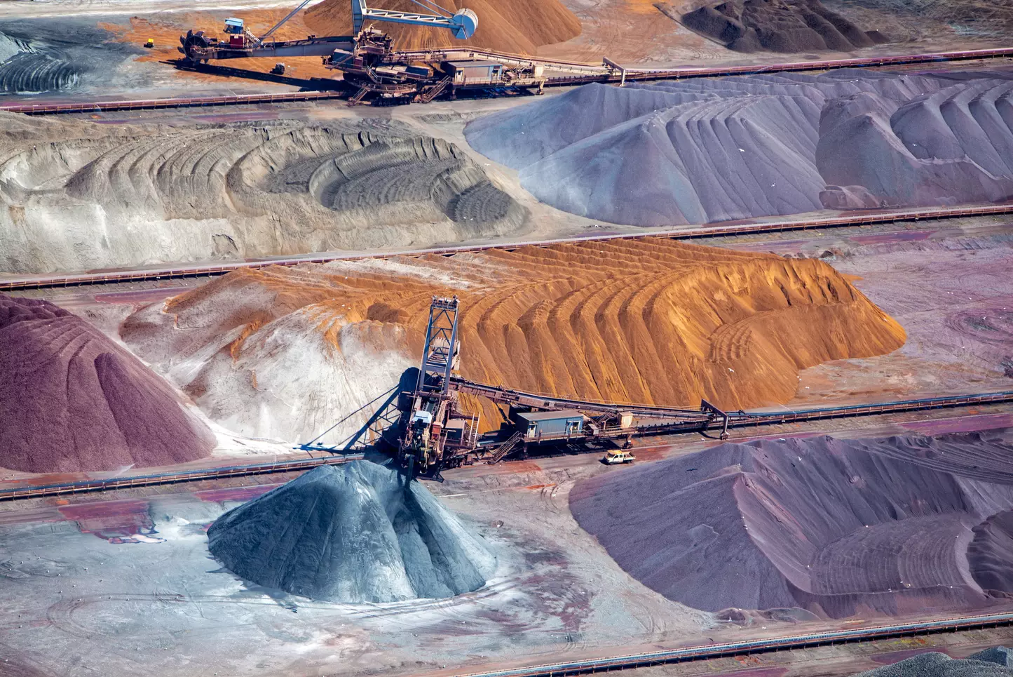 A conveyor belt at a mine, the energy and digital transition put pressure on resources such as minerals, rare earths and metals