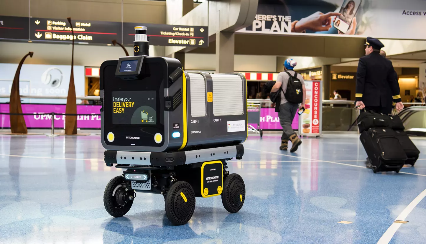 Ottobot by Ottonomy at service in an airport